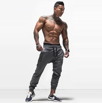 Muscleguys značky mens joggers nohavice kulturistike telocvične oblečenie, tepláky, športové hip hop hárem nohavice fitness mužov nohavice
