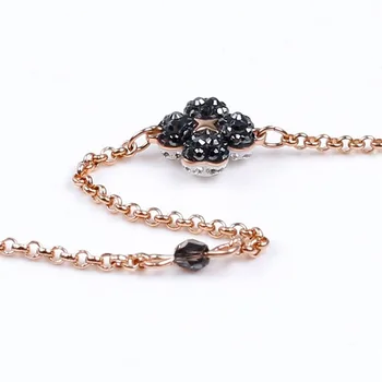 Módne šperky vysokej kvality swa šarm čiernej a bielej obojstranné four-leaf clover neviditeľný magnetický pracky náramok ženy.