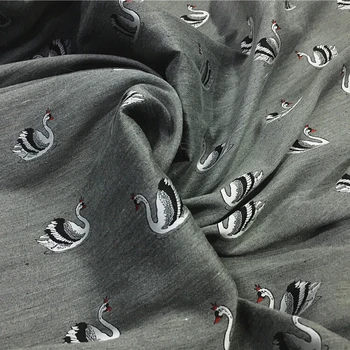 Rozšírené žakárové šaty dieťa veľké silnej tkaniny Xia Chunqiu zimné oblečenie swan vyhovovali módne farby tkaniny